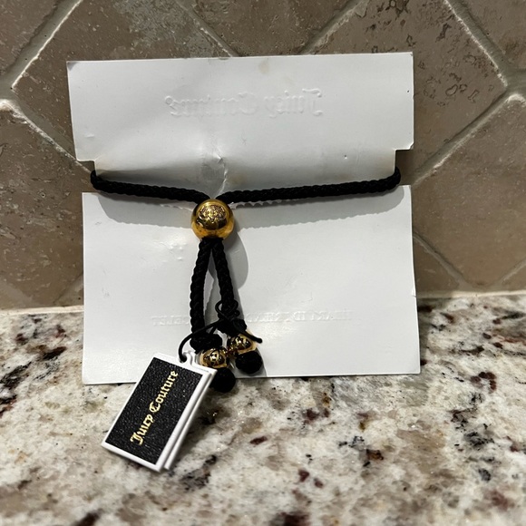 Juicy Couture Black and Gold Heart Bracelet - Picture 2 of 4